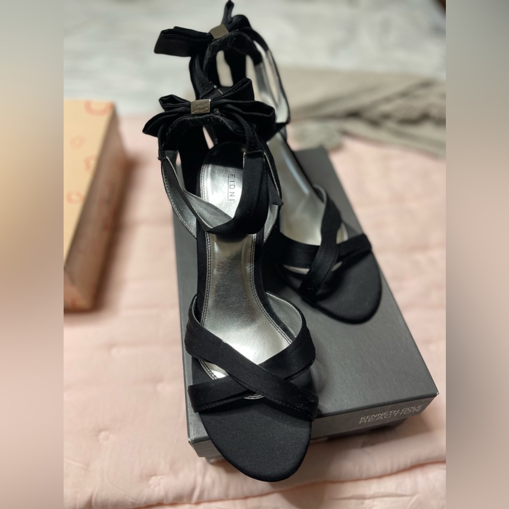Be holiday ready. Black formal with silver heel!